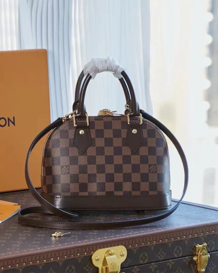 REBCE Louis Vuitton Alma BB - Chic and Compact