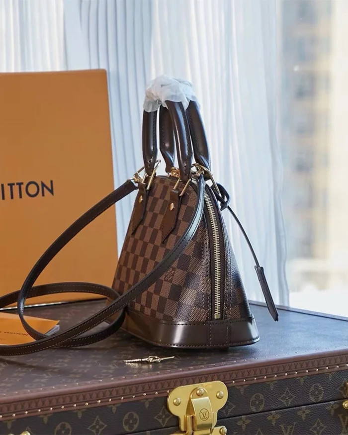 REBCE Louis Vuitton Alma BB - Chic and Compact