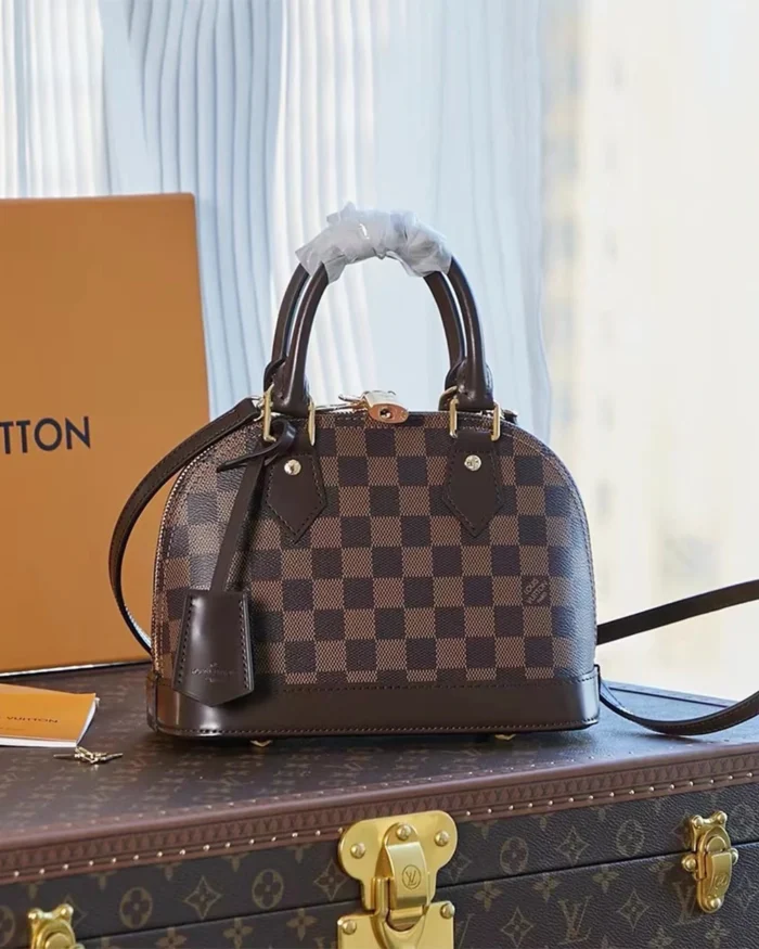 REBCE Louis Vuitton Alma BB - Chic and Compact