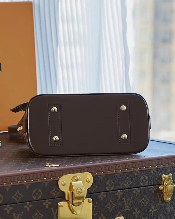 REBCE Louis Vuitton Alma BB - Chic and Compact