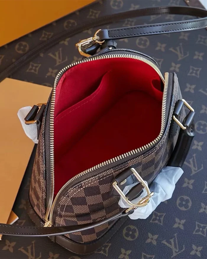 REBCE Louis Vuitton Alma BB - Chic and Compact