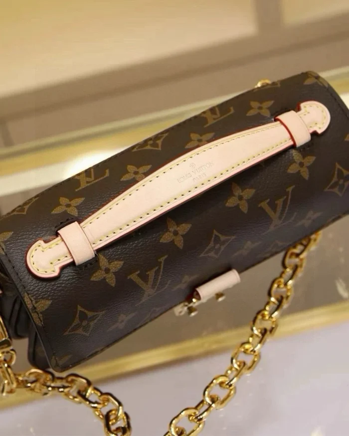 REBCE Louis Vuitton Métis East West Pochette