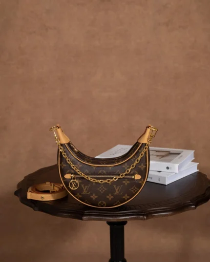 Rebce Louis Vuitton Loop half-moon bag