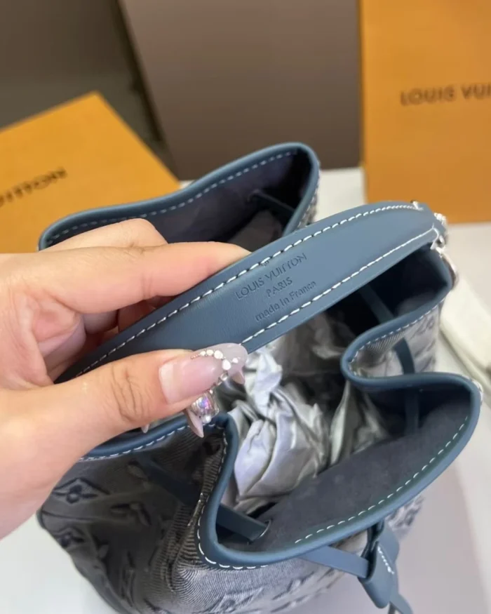 Rebce Louis Vuitton Champagne Bucket Bag